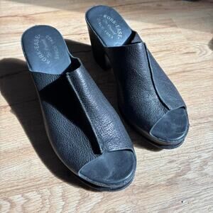 Black leather platform mules